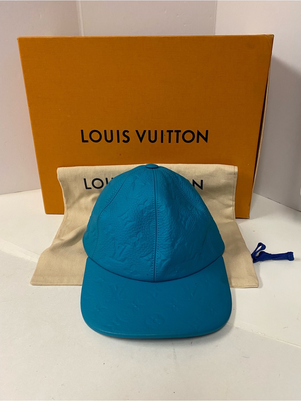 Authentic Louis Vuitton Taurillon
Monogram 1.1 Leather Cap - Turquoise
Size 58